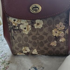 Coach brand new sitting around looking cute on a shelf. Paid well over 300.